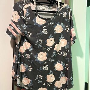 Size medium floral Maurices top with peekaboo cutout shoulders